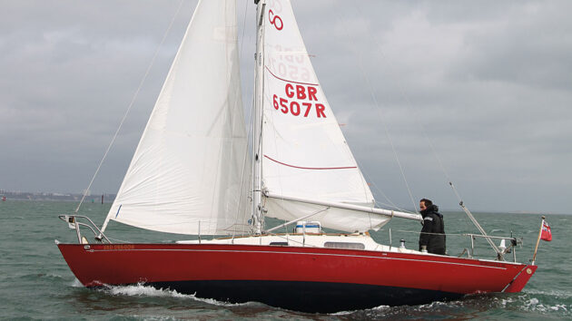 A solo sailor sailing a boat