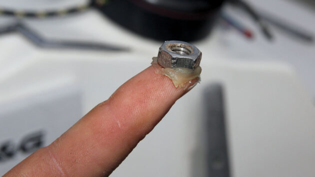 A person using a blob of mastic