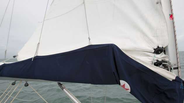 Tack blocks on a slab reefing system on a boat