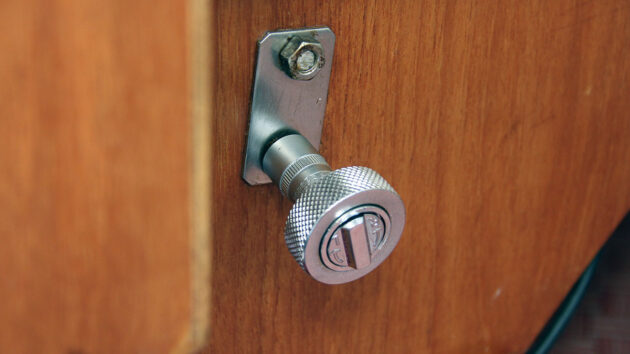 A thumb ratchet being used on a boat