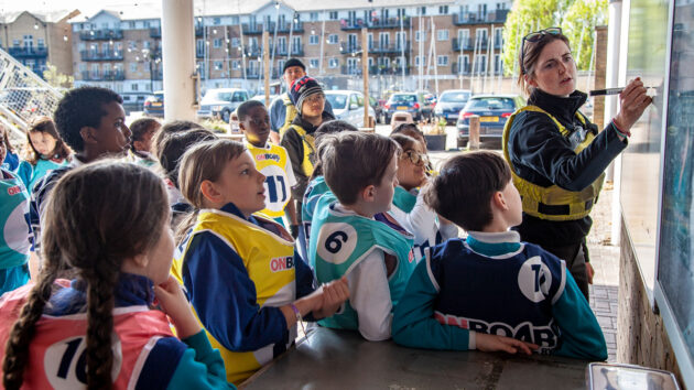 Young sailors with an instructor. Credit: RYA