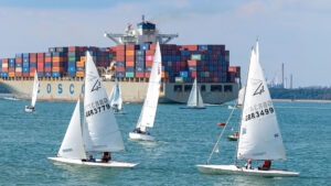 People sailing in a Flying Fifteen fleet