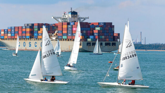 People sailing in a Flying Fifteen fleet