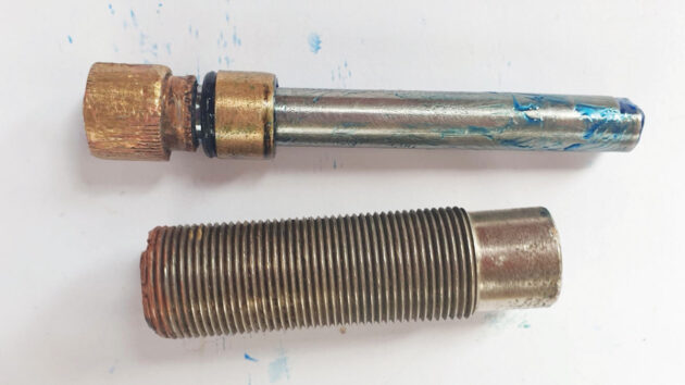 Shaft and housing for a windscreen wiper motor for a boat