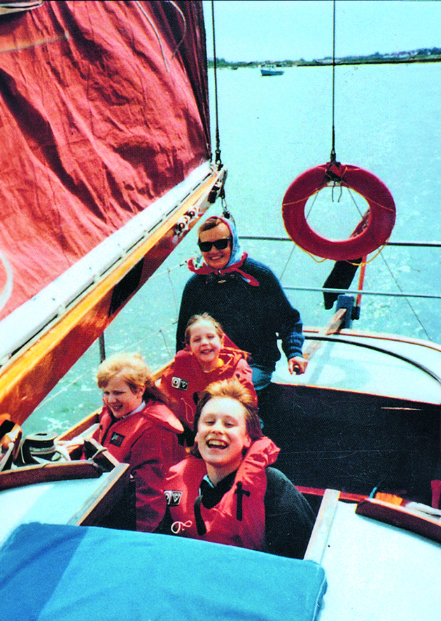 A woman sailing with children