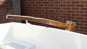 A tiller on the back of a boat