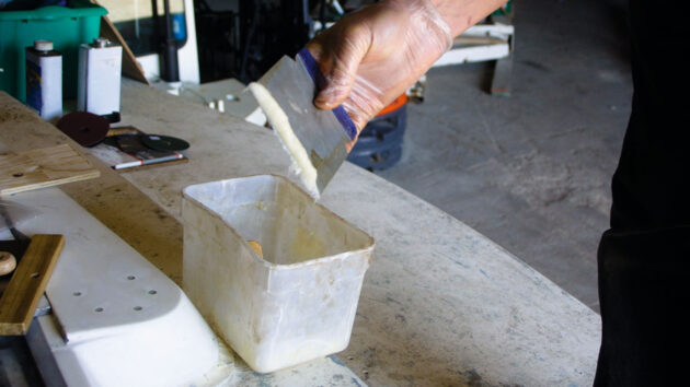 Fairing compond being used on plywood decks on a boat