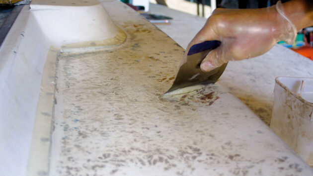 A man doing boat work