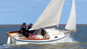 A Kite trailer sailer boat being sailed at sea
