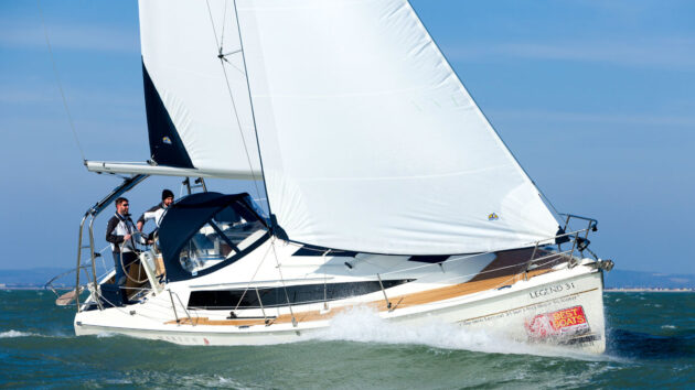 Two men sailing on a Legend 31 sailing yacht