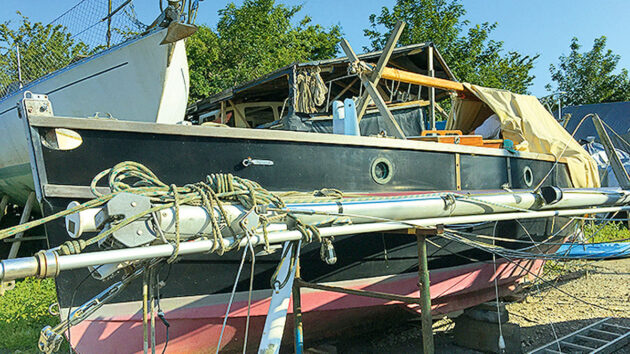 A mast lying on a yacht