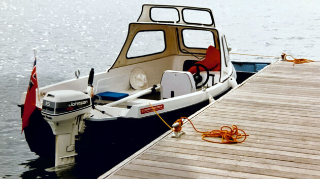 A boat moored by a pontoon