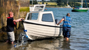 An Orkney Coastliner 14 being launched in a harbour