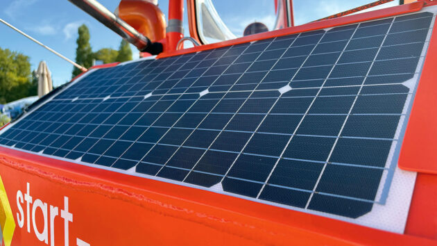 Solar panels on the side of a microyacht belonging to Andrew Bedwell