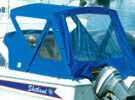 A boat canopy on a boat with an outboard