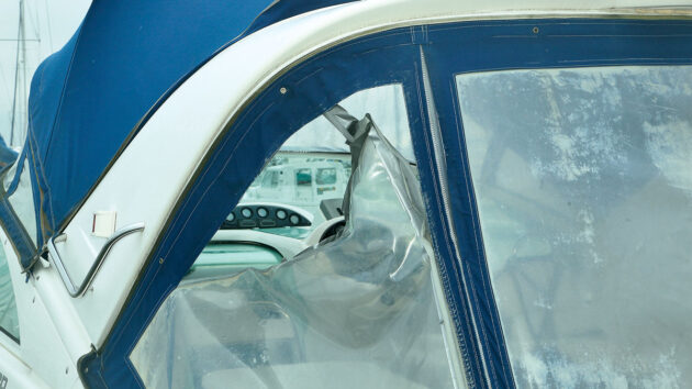 A damaged window on a boat