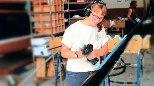 A woman working on a boat rig