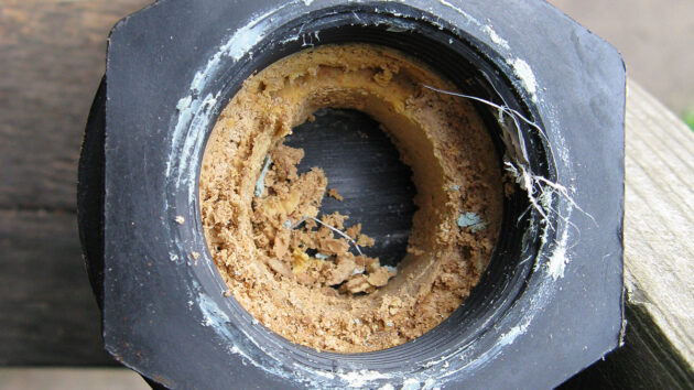 A scaled up toilet pipe o a boat