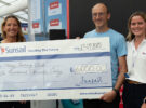 People holding a cheque having won the Sunsail Funding the Future in 2025