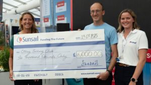 People holding a cheque having won the Sunsail Funding the Future in 2025