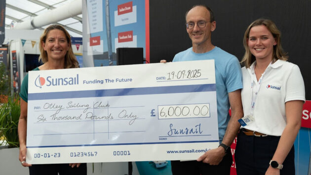 People holding a cheque having won the Sunsail Funding the Future in 2025