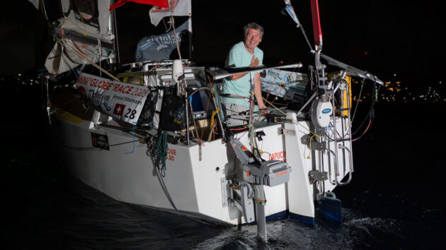A man on his Globe 5.80 yacht during the Mini Globe Race 2025