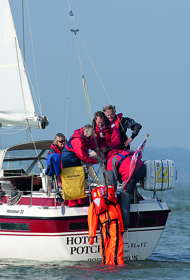 A crew recovering a dummy
