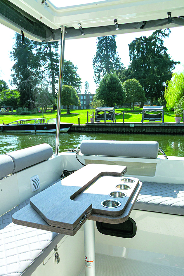 Outdoor seating area in the cockpit of a SunCamper 31