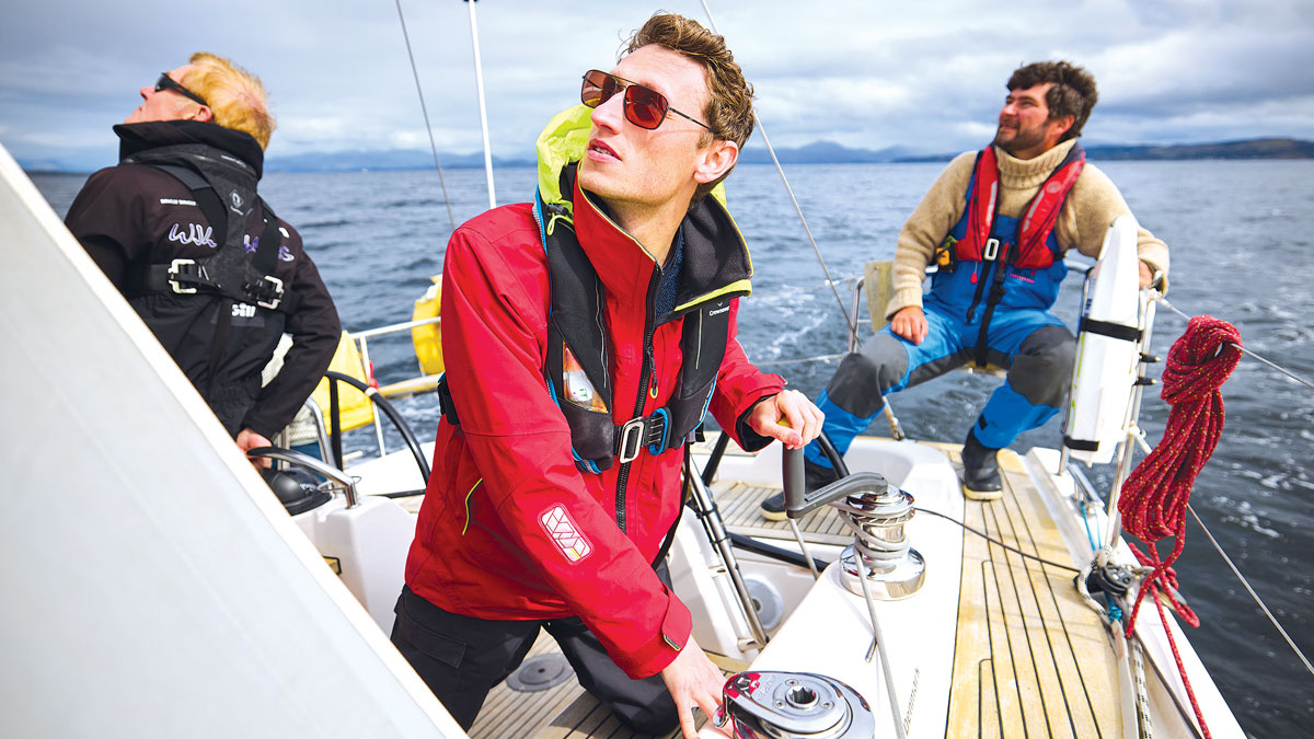 Boat crew in the cockpit of yacht