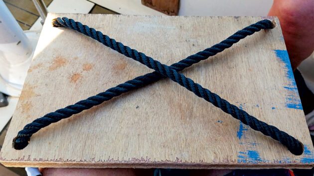 Rope being used to make a boat step