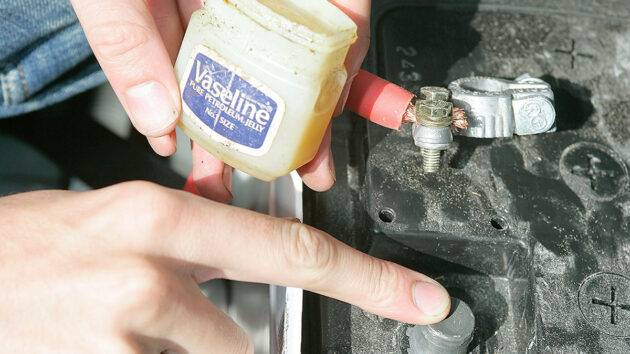 Vaseline being applied to a battery