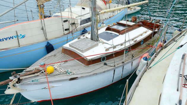 A boat moored alongside another boat