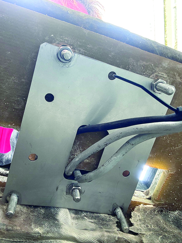 A stainless steel backing plate