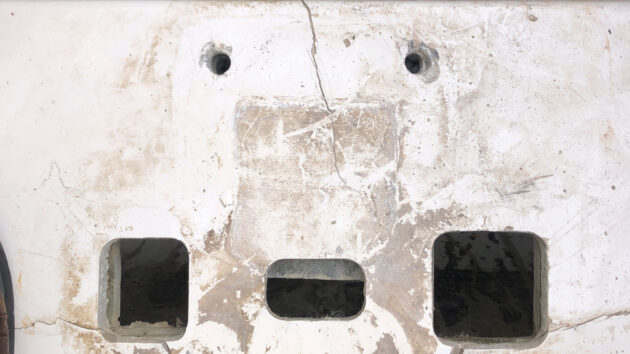 A cracked anchor windlass panel on a boat