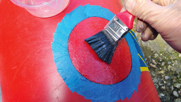 Repairs being made to a dinghy
