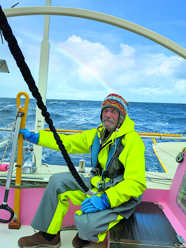 Pete Hill at the helm of a boat