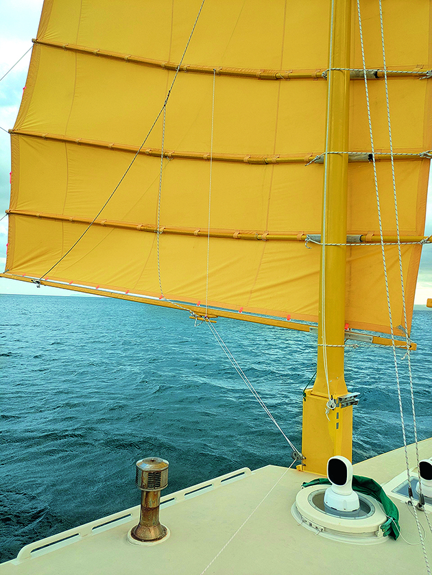 A fan-up preventer on a junk rig sail on China Moon, the catamaran that was designed and built by Pete Hill