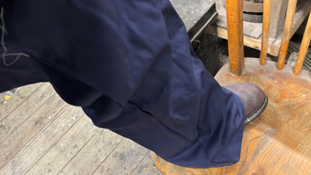 A woman wearing incorrect fitting PPE