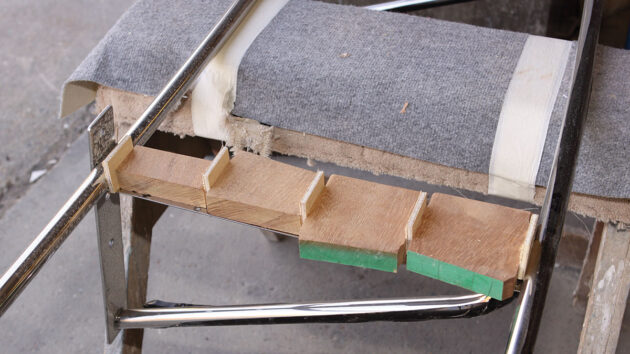 Wood attached to a stainless steel frame