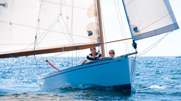 Two people sailing in an open boat