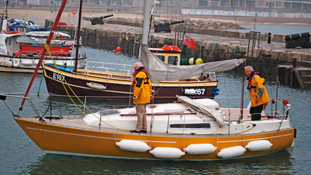 A yacht with fenders