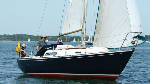 A man sailing a Trapper 500 yacht