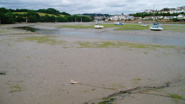 Yachts dried out on an estuary