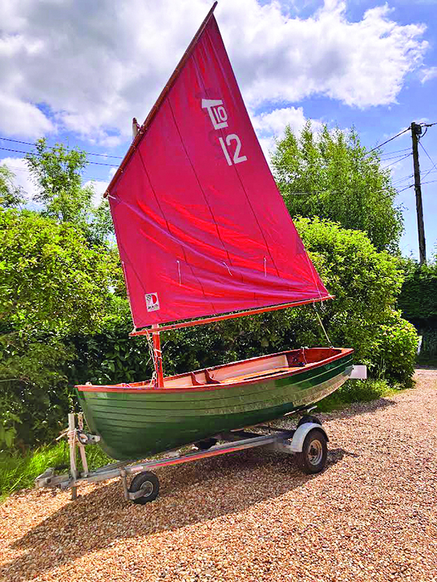 A Tideway 10 cruising dinghy on a trailer
