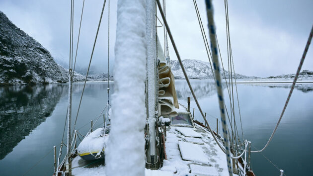 A yacht covered in snow