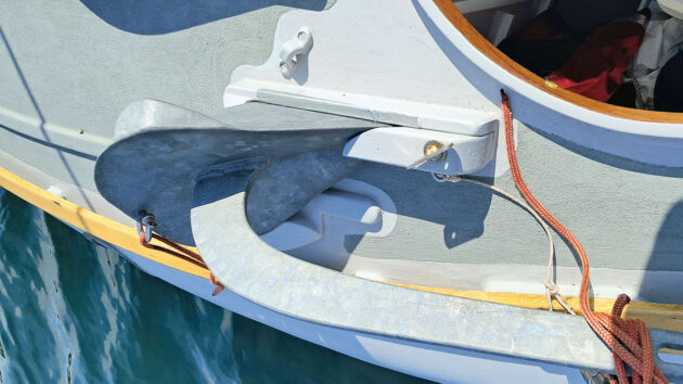 An anchor stowed on a boat