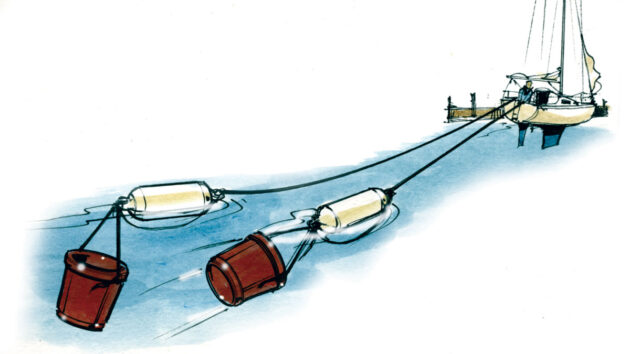 A yacht with buckets behind it