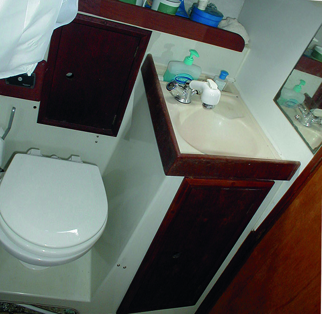 A toilet and sink on a yacht