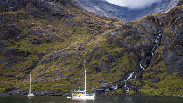 Towering Black Cuillin mountains surround the anchorage of Loch na Cuilce. Credit: Bertrand Gardel/Hemis/Alamy