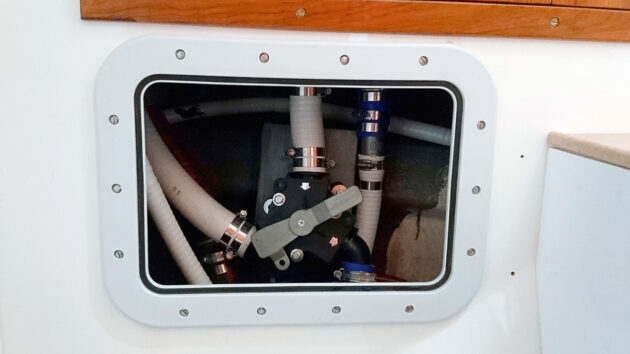 Pipes for a waste holding tank on a boat